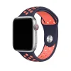 Silver Apple Watch with navy blue and bright mango sport band strap