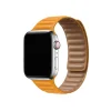 Smartwatch with silver case and golden yellow leather link band