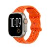 Apple Watch with orange glitter sport band and silver case