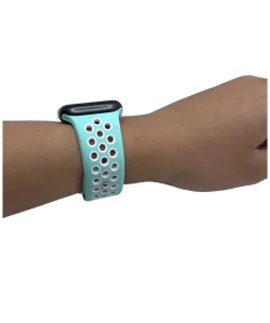 Turquoise perforated sport watch band with black top, worn on wrist