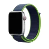 Silver smartwatch with neon lime and navy sport loop band