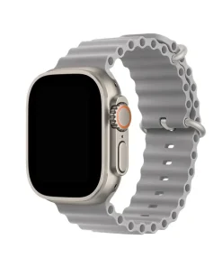 Silver titanium smartwatch with concrete gray ocean band and orange digital crown