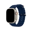 Smartwatch with silver case and navy blue ocean band with orange dial