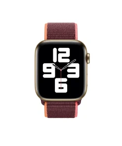 Gold smartwatch with plum sport loop band displaying time