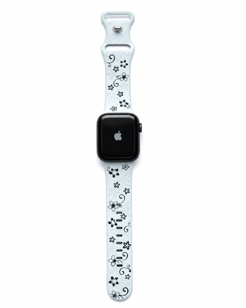 Apple Watch with white floral sport band featuring black flower designs
