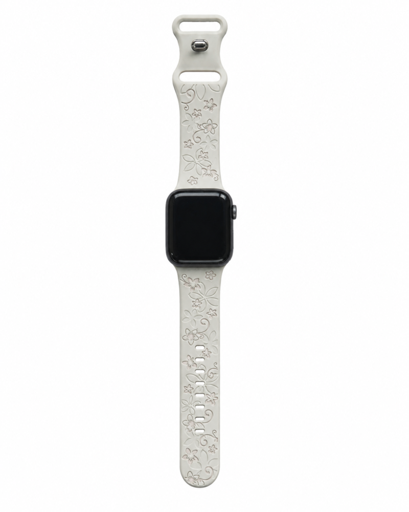 Apple Watch sport band with cream floral pattern design and adjustable closure