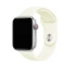Silver Apple Watch with soft white sport band and cellular dial