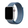 Silver Apple Watch with blue woven sport loop band and red digital crown