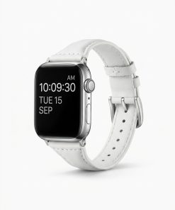 Apple Watch with white leather strap band showing time display