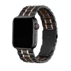 Black stainless steel Apple Watch band with rose gold accents