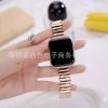 Rose gold metal strap smartwatch band with black display screen