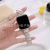 Silver metal strap smartwatch with black square display on hand
