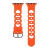Bright orange silicone smartwatch band with perforated design and metal buckle