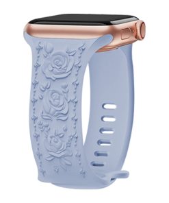 Light blue silicone smartwatch band with rose floral pattern and rose gold case