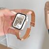 Loewe smartwatch rose gold mesh band vintage design displayed on hand