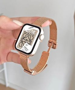 Loewe smartwatch rose gold mesh band vintage design displayed on hand