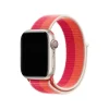Apple Watch with pink orange nectarine sport loop band and red digital crown