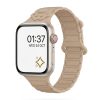 Beige smartwatch with paw print magnetic band and digital display showing time