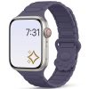 Apple Watch with purple silicone band and misty color display showing time