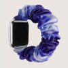 Silver smartwatch with purple satin scrunchie strap accessory
