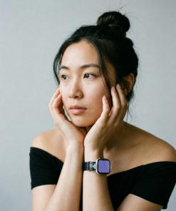 Woman wearing black leather crystal Apple Watch band on wrist