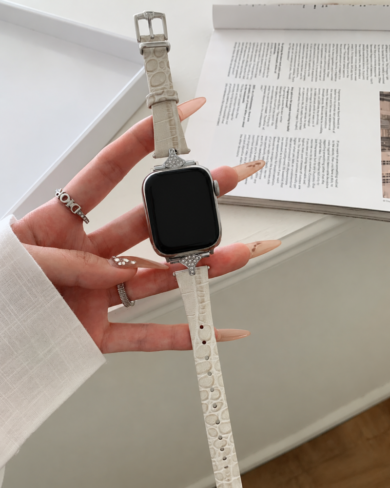 Smartwatch with cream leather crocodile strap and crystal buckle charm detail