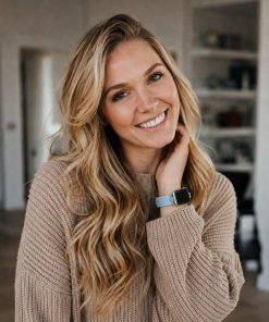 Lake blue leather Apple Watch band on woman's wrist, stylish accessory