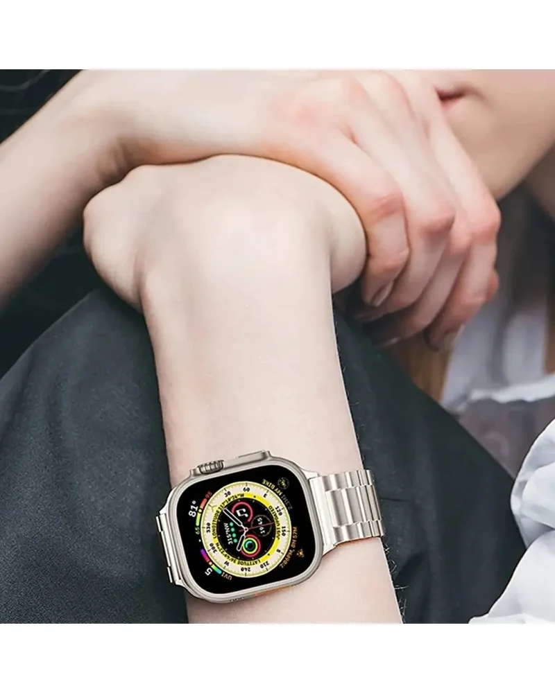 Stainless steel smartwatch with yellow dial face on wrist display