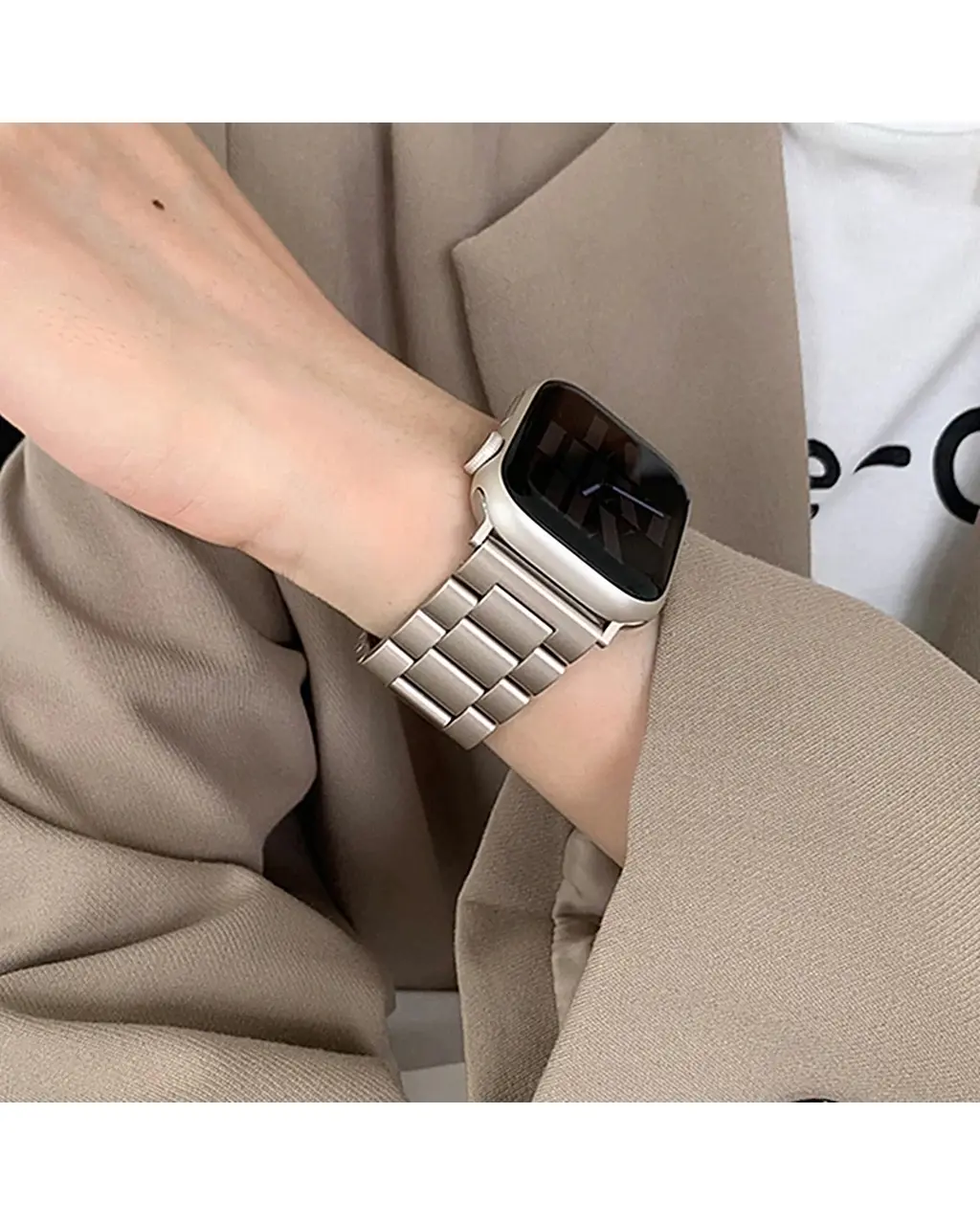Silver stainless steel smartwatch band with square face on wrist